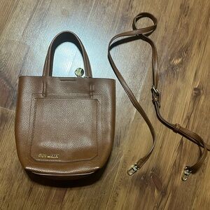 Brown Steve Madden purse with attachable satchel.